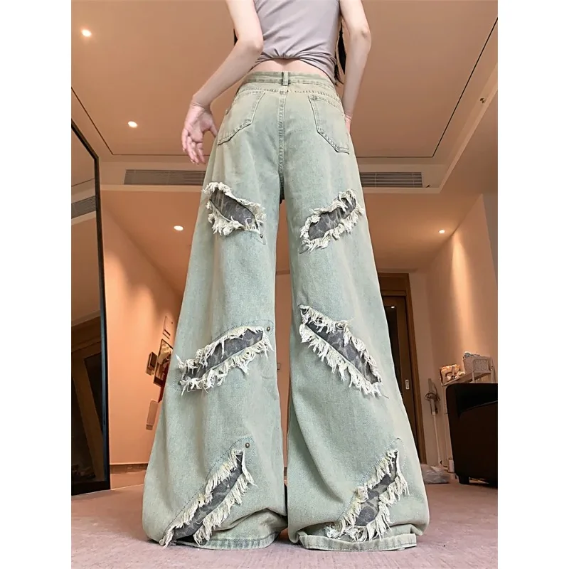 อเมริกัน Retro Wasteland Fengshui ซักผ้าเก่า Ripped กางเกงยีนส์ผู้หญิงฤดูร้อนฤดูใบไม้ร่วงสไตล์ใหม่ High-End Niche กว้างขากางเกง