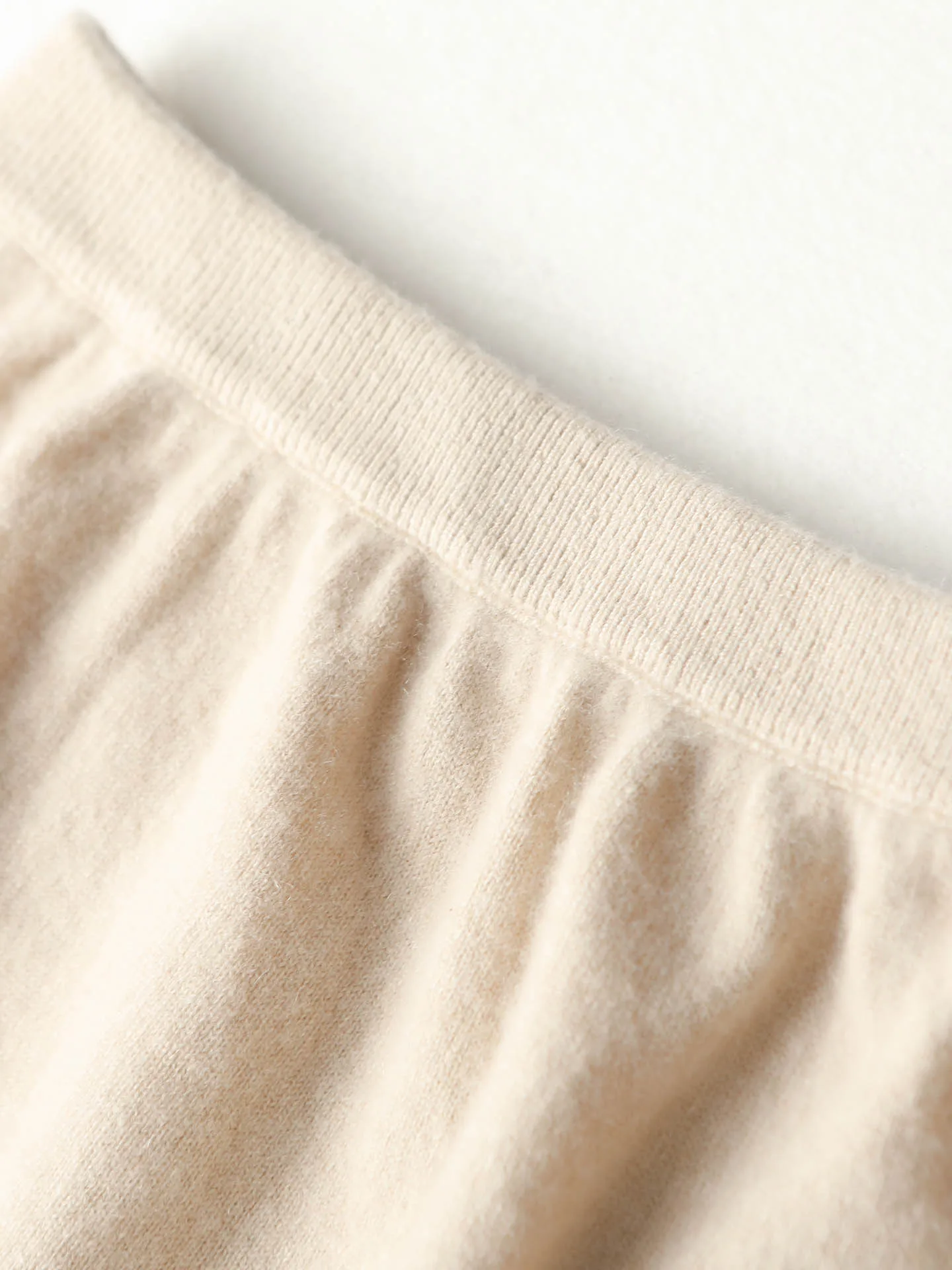 Merino 100% laine a-ligne jupe à bord roulé automne hiver doux décontracté cachemire tricoté une étape jupe courte