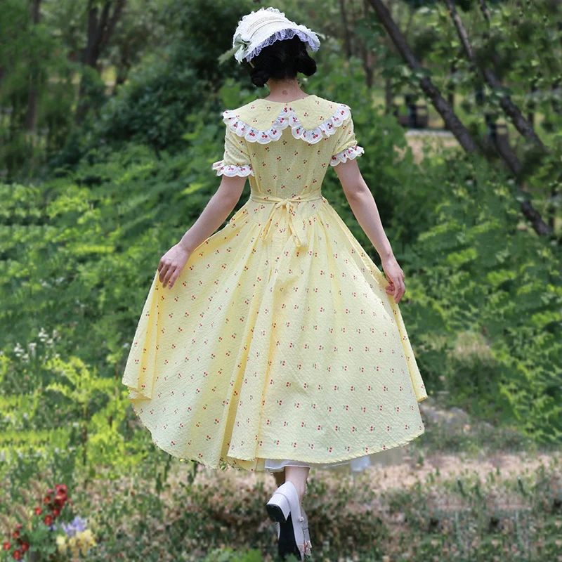 AnXin SH Vintage Prinzessin gelbe Baumwolle Kirschdruck Blumenspitze V-Ausschnitt Kurzarm Knopf Reißverschluss individuelles Abendkleid