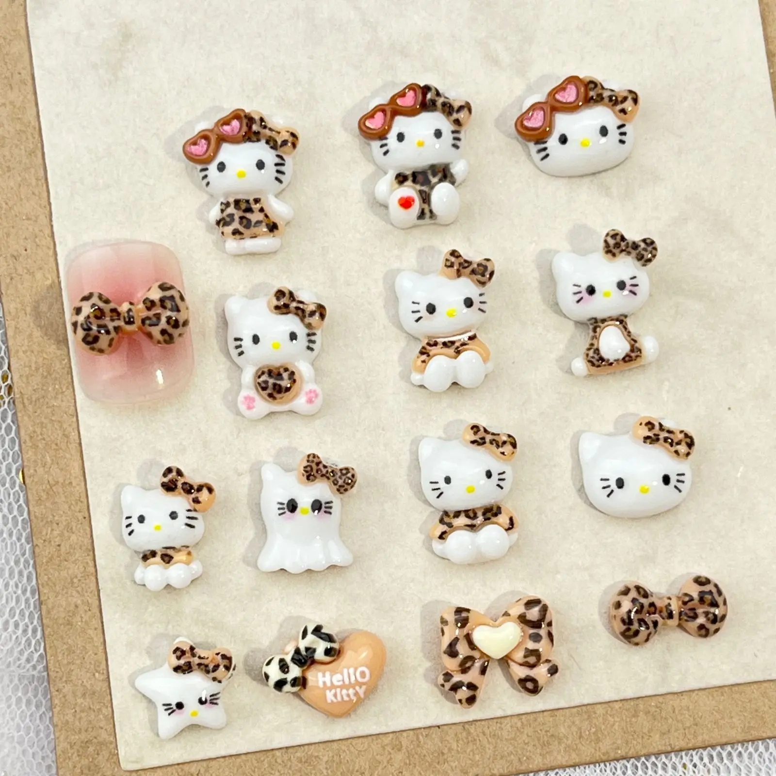 

New Nail Art Accessories Anime Cartoon Sanrio Hello Kitty Leopard Print Series Cute Glasses Bow Handmade Wear Nail Diy Toys