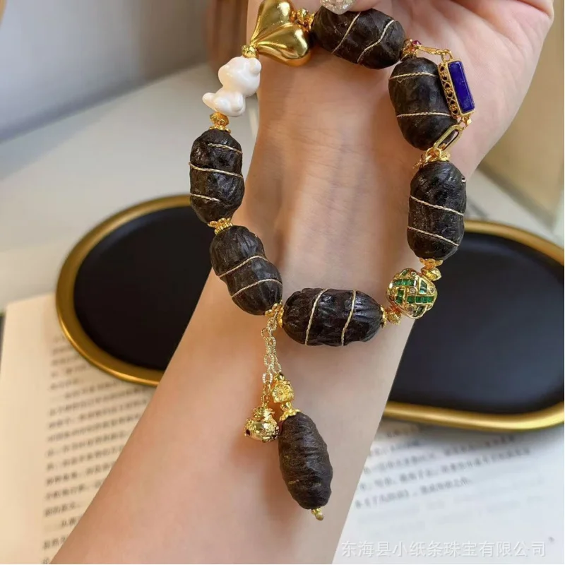 

Одиночный круг с червоточиной Хайнань и медным браслетом из бисера Tuo Gu, инкрустированным удачей