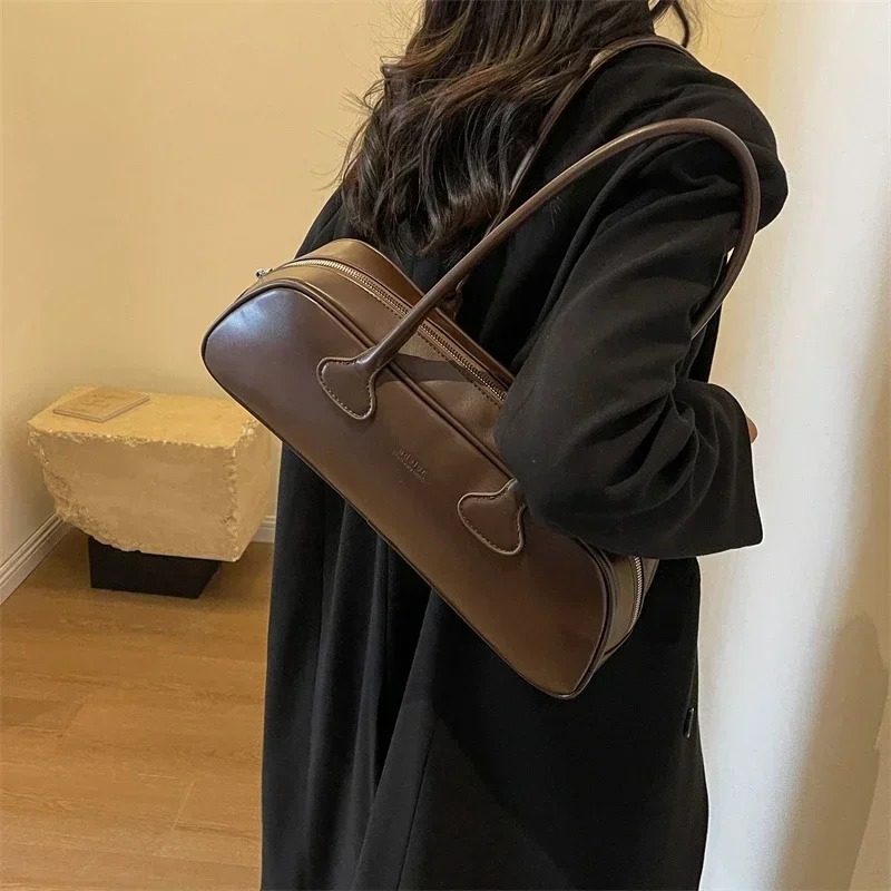 PU Baguette Fashion Popularity Shoulder Bags Simple Versatile Sense of Luxury Hand Bags for Women 2024 Wysoka jakość Gorąca wyprzedaż