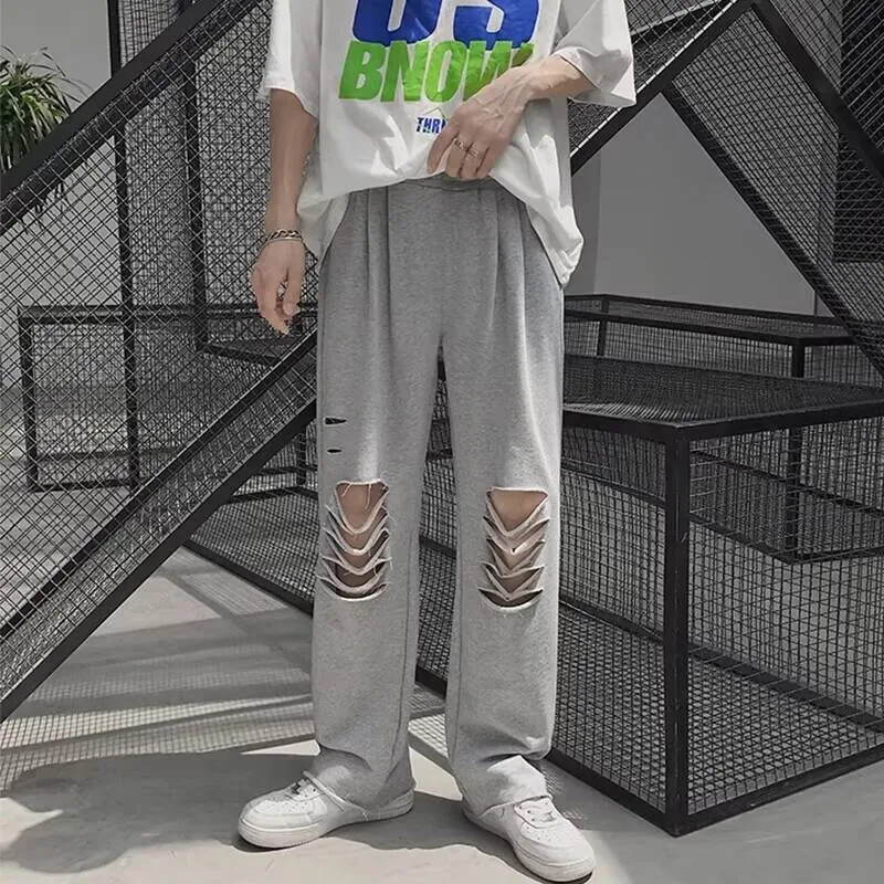 

Осенние брюки, прямые мужские брюки-трубы и гвардии, весенний новый стиль, индивидуальный дизайн с отверстиями, модные популярные молодежные свободные большие брюки для отдыха