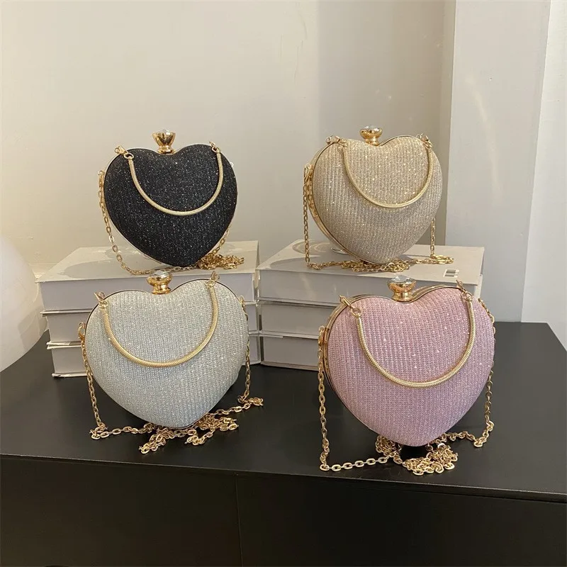 Bolso de mano de noche para mujer, bolso brillante con forma de corazón, bolso de mano de Metal, bolso de hombro tipo bandolera con cadena a la moda, bolso de lujo para mujer