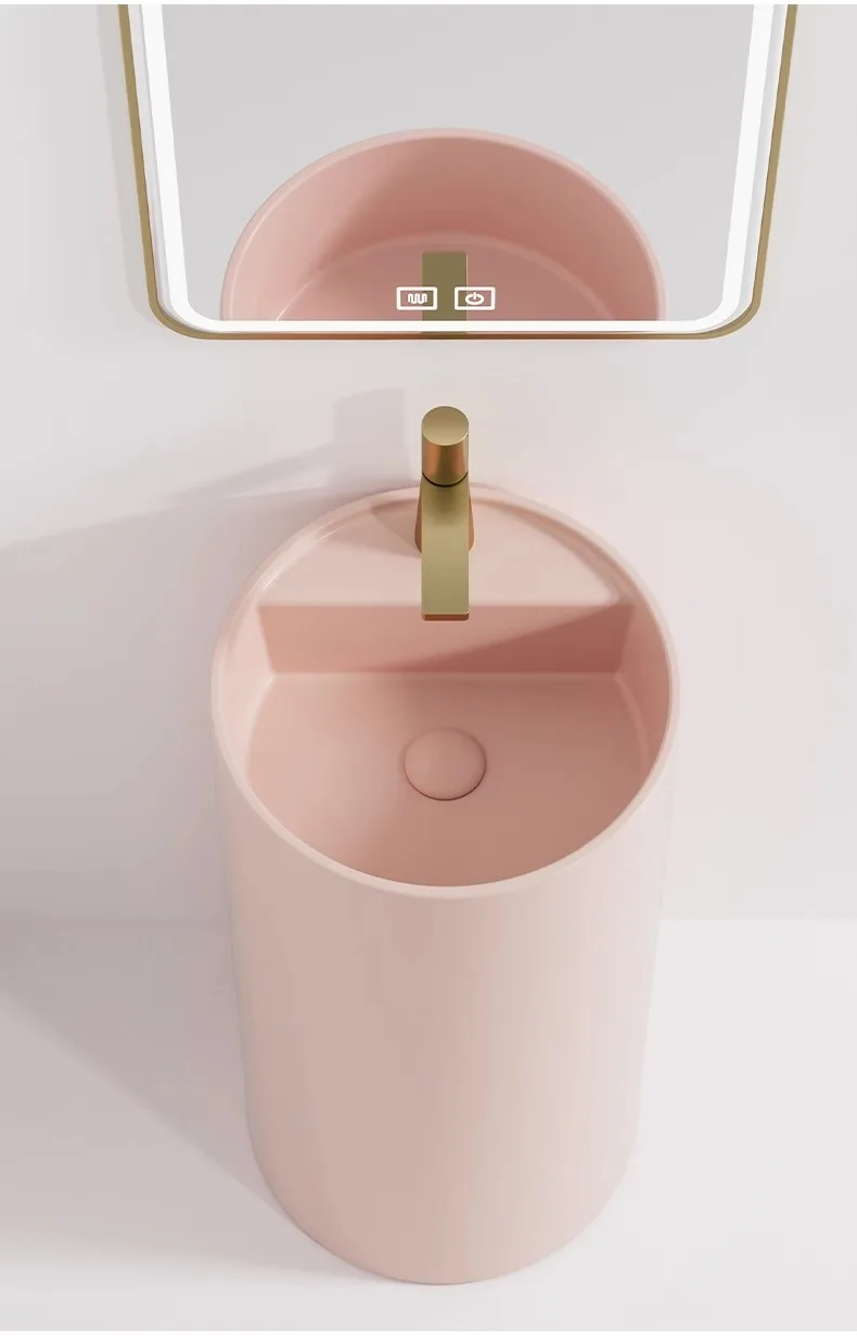 

Nordic style colored ceramic column basin, round light pink integrated floor standing washbasin, for balconies, hotels GN284DA