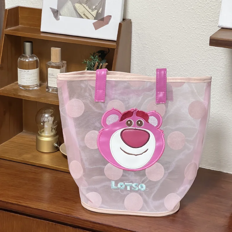 Disney three-eyed boy cute and funny mesh hand-held women's bag strawberry bear cartoon polka dot simple portable beach bag