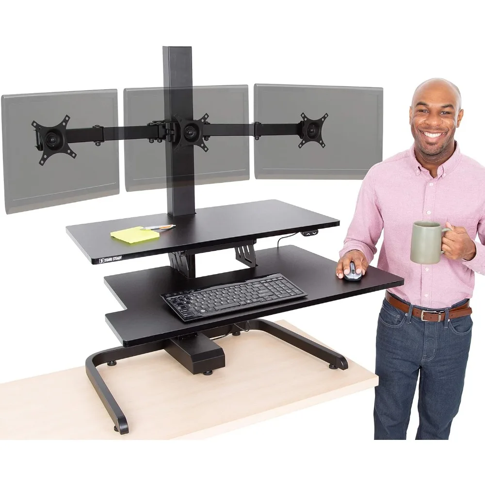 

Techtonic Electric Standing Desk Converter with Triple Monitor Mount, 3 Screen Support, Quiet Sit-Stand Desk with Button Contro
