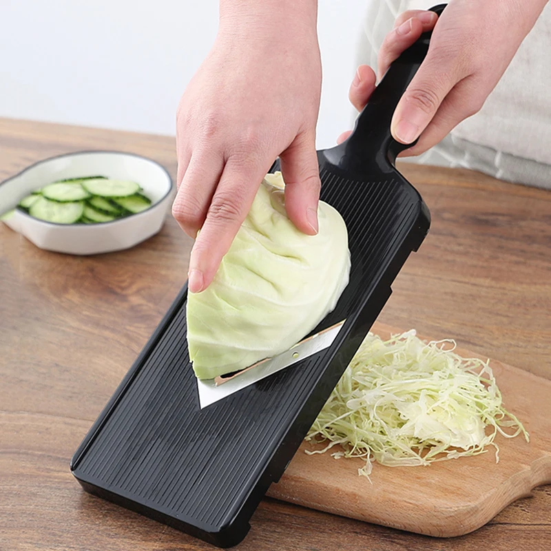 

Cabbage grater Japanese salad shavings slicing artifact round cabbage purple cabbage shredded special planer