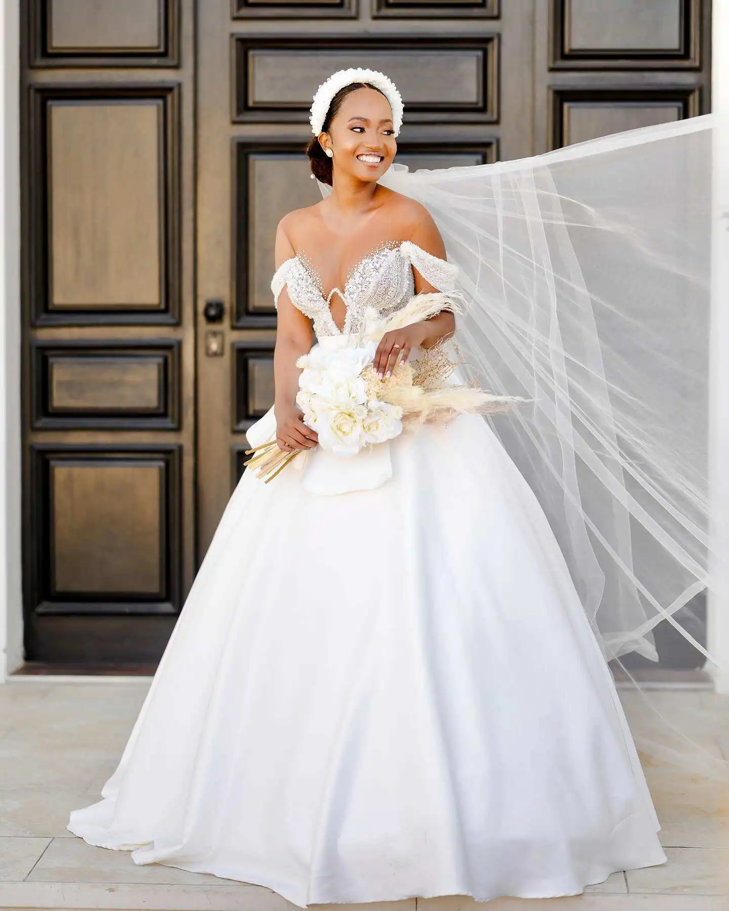 Customized Timeless Wedding Dress with Off-the-Shoulder Design and Beaded Embellishments