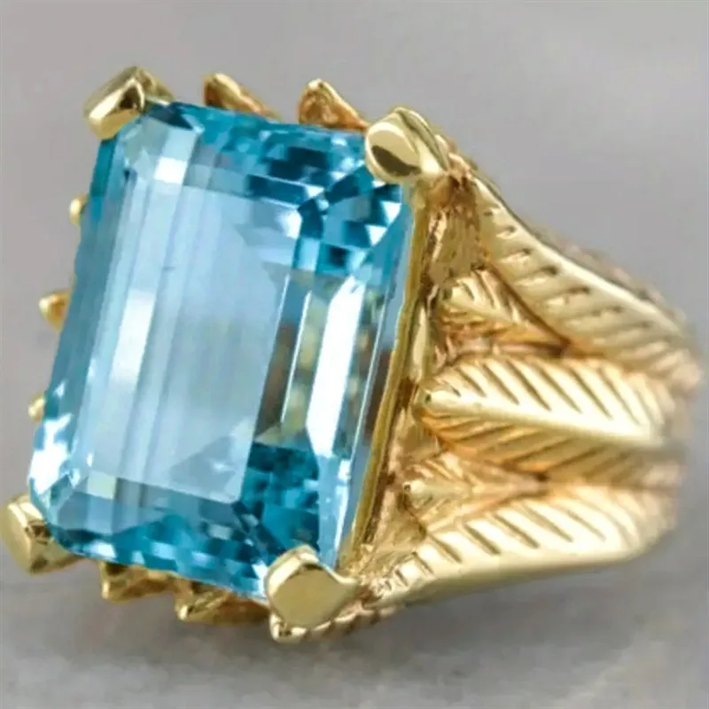 Huitan Hyperbole Ring mit blauem Zirkonia für Damen, Jahrestag, Party, Schmuck, Geschenk, goldfarben, Modeaccessoires für Damen