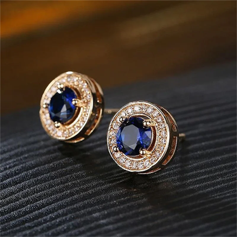 Pendientes redondos clásicos de circonita azul real y rojo champán para mujeres y hombres, pendientes de circonita blanca de Color dorado antiguo, regalo de joyería