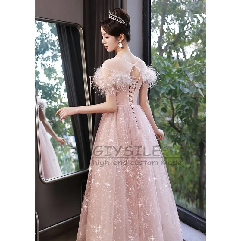 GIYSILE カスタマイズされたピンクのスパンコールフェザーイブニングドレス女性 2025 新ファッションプリンセスパーティー A ラインストラップバックショルダークランプ