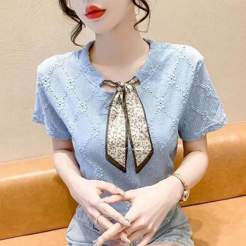 2023 Summer Fashion Korean Edition Round Neck Lace Up Reduced Age Lace Hollow Jacquard Short Sleeve Women\'s Solid Color Shirt