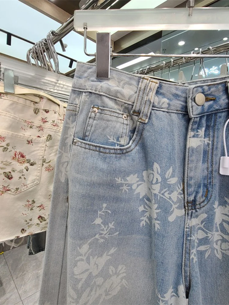 Novedad de verano para mujer, pantalones de suelo a la moda y con estilo, pantalones vaqueros de pierna ancha rasgados con estampado floral retro de estilo americano