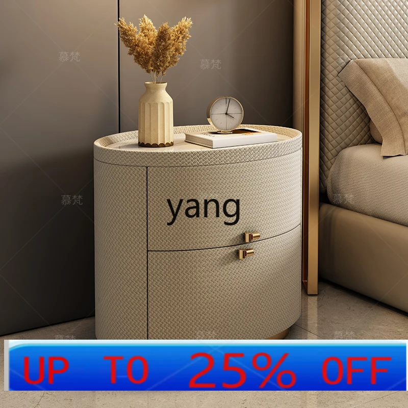 

Lmm Italian minimalist bedside table light luxury rock slab bedroom oval leather art Internet celebrity bedside table