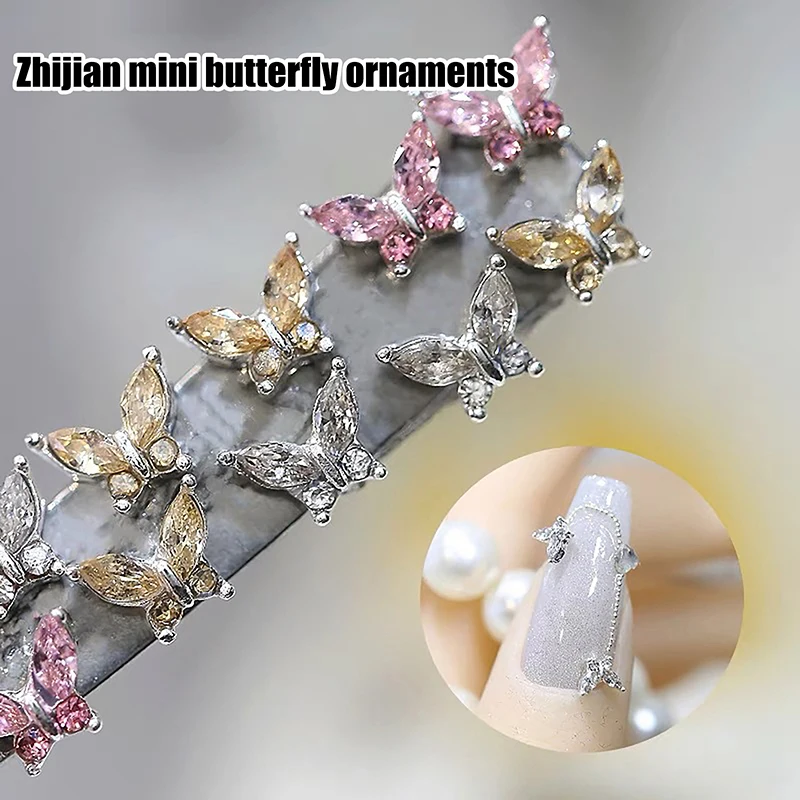 3D Mini Cristal Borboleta Nail Art Encantos, Jóias de Luxo Acessórios, Liga Strass, Unhas Decoração Suprimentos, 4x6mm, 10Pcs