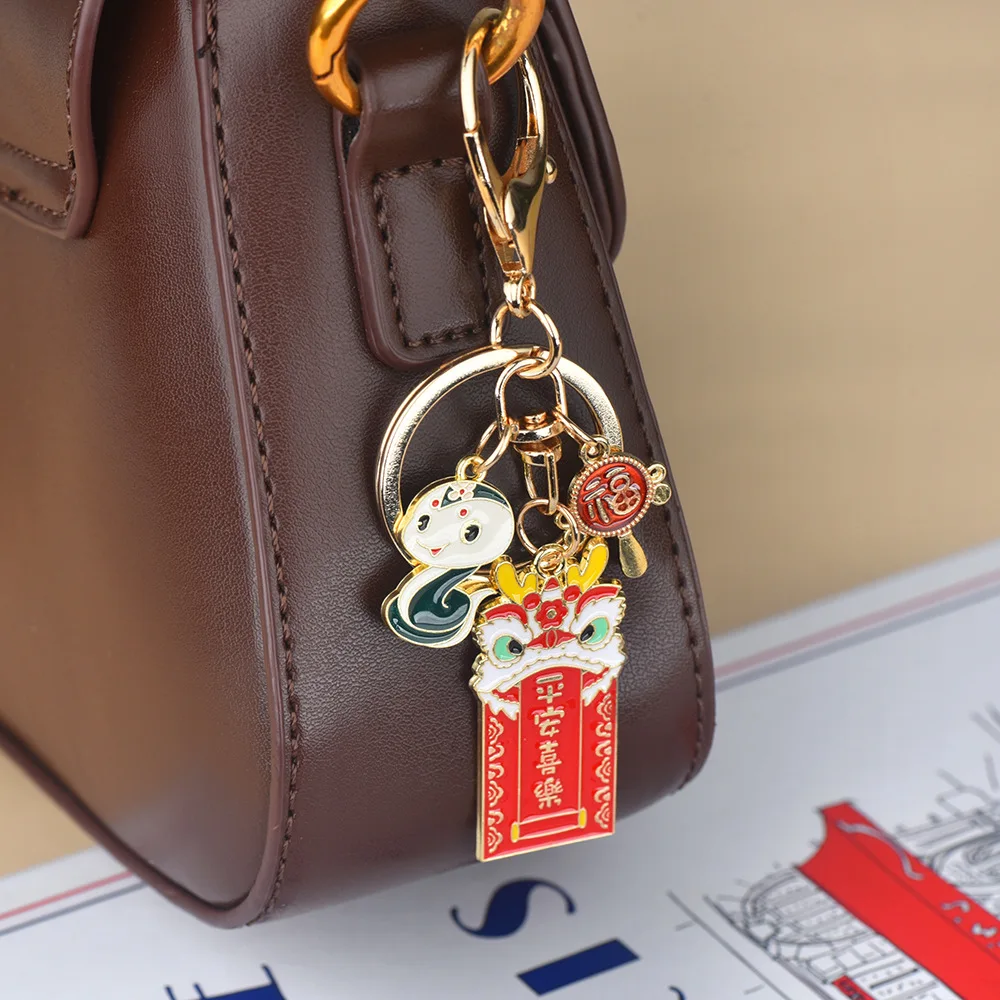 السنة الجديدة السلام الفرح الحظ شخصية مفتاح سلسلة ثعبان سنة الأسد الصحوة قلادة تهنئة على الثروة حلقة رئيسية #1