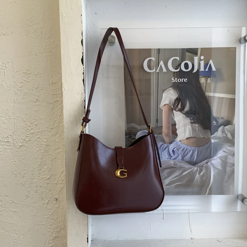 حقيبة يد جلدية مصممة شهيرة، حقيبة يد نسائية للمكتب، حقيبة ساعي البريد عبر الجسم إكسسوار أنيق #1