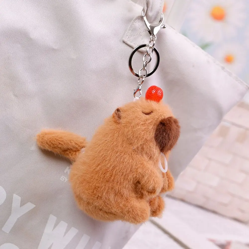 Kawaii Luminous Plush Capybara Keychain PP Cotton Wagging Tail Cartoon Couple Pendant Music Doll Capybara Keyring Bag Ornaments