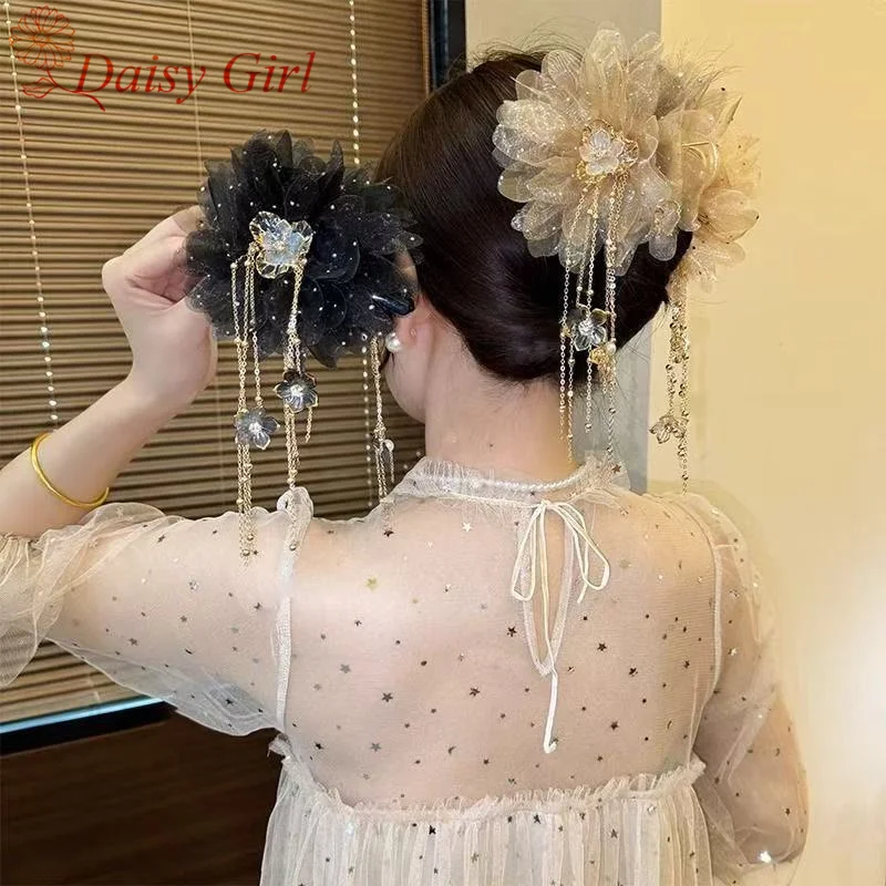 

Fashionable diamond-inlaid resin flower shell tassel grab clip temperament versatile hair shark clip hair accessories