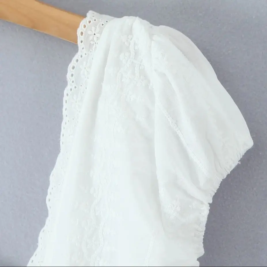2025 White Embroidery Hollow Out Hole Splice Lace V neck Short Puff Sleeve Shirt Women Center Button Elastic Back Slim Crop Tops