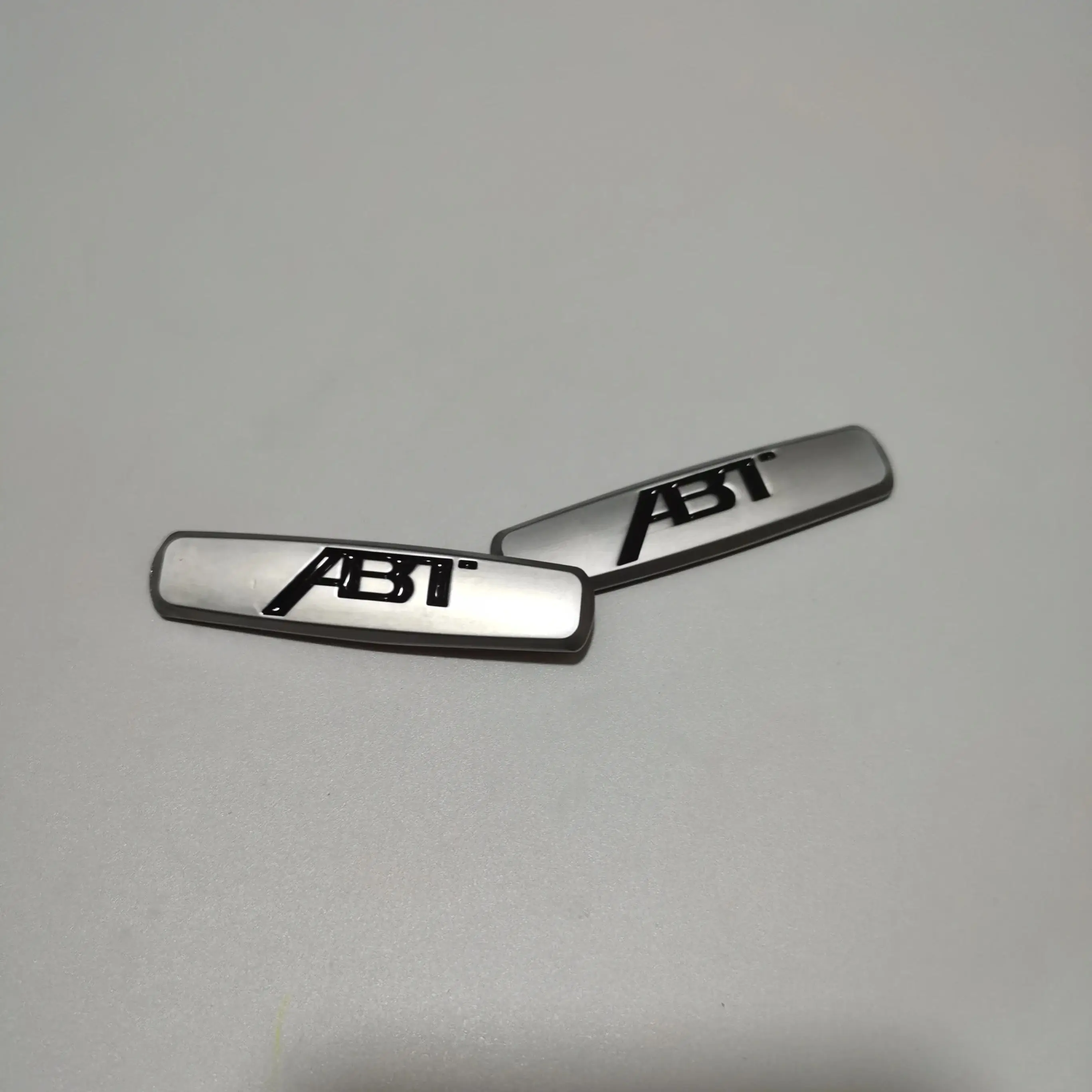 

2 шт./лот, серебряная эмблема ABT для Audi, наклейка на автомобильное сиденье, наклейка для VW AUDI RS3 RS4 RS5 Q5 Q7 Q3 SQ5 A6 A7 A8 A4 A5 A3 S4 S5 TTS