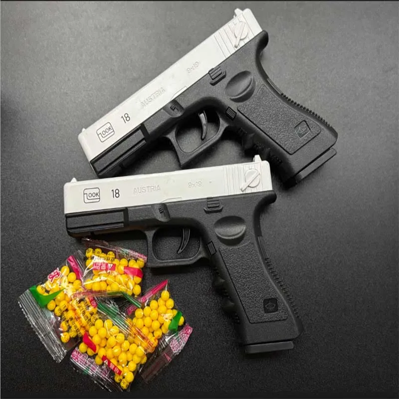 Pistola de balas suaves Airsoft Manual G18, pistola de juguete, revista inferior con láser, juego CS para deportes al aire libre, regalo para niños y adultos