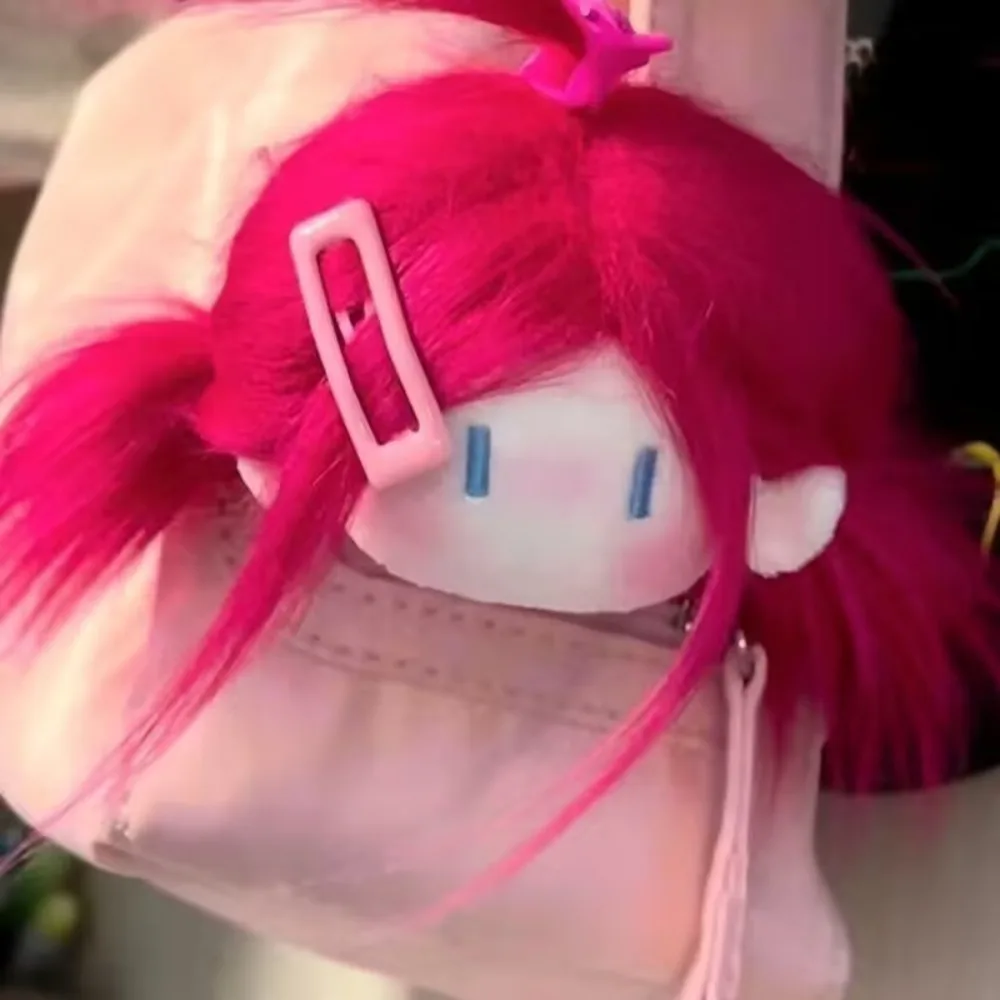 Peluche cheveux longs poupée pendentif dessin animé conception poupée fille poupée fille tête porte-clés poupée mignonne