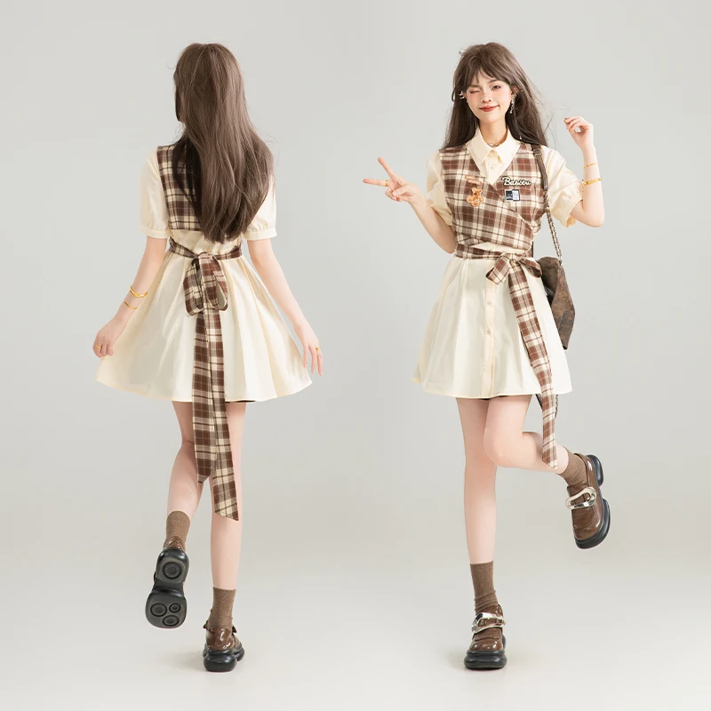 Été 2025 nouveau beau à lacets serrer la taille faux deux pièces chemise Plaid épissage en forme de col de chemise robe courte