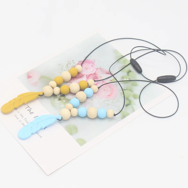 1PC Baby Products Feather Gum Necklace Baby Soothing Teeth Grinding Silicone Necklace Baby Accessories Newborn Teethers