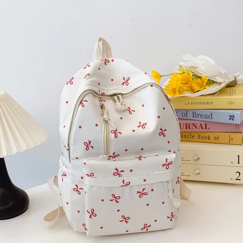 

Playful Bow Print Back To School Season Quilted Backpack Large Capacity Multi Pocket Adjustable Straps for Daily Use