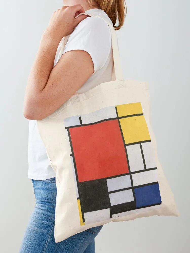 

Piet Mondrian's Composition with Red, Yellow, Blue, and Black (1921) famous painting Tote Bag canvas shopping bag