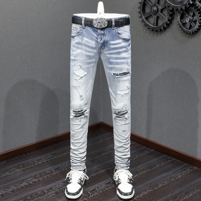 Fashionable new denim jeans washed nostalgic distressed black leather patch elastic slim fit light blue jeans high street hip-ho