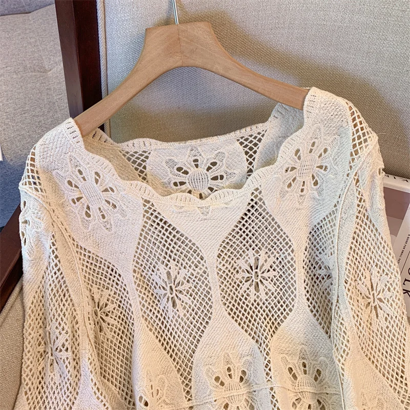 Camicia per protezione solare in pizzo allentato per le vacanze estive al mare Moda sexy scava fuori felpa con cappuccio all'uncinetto Top da donna