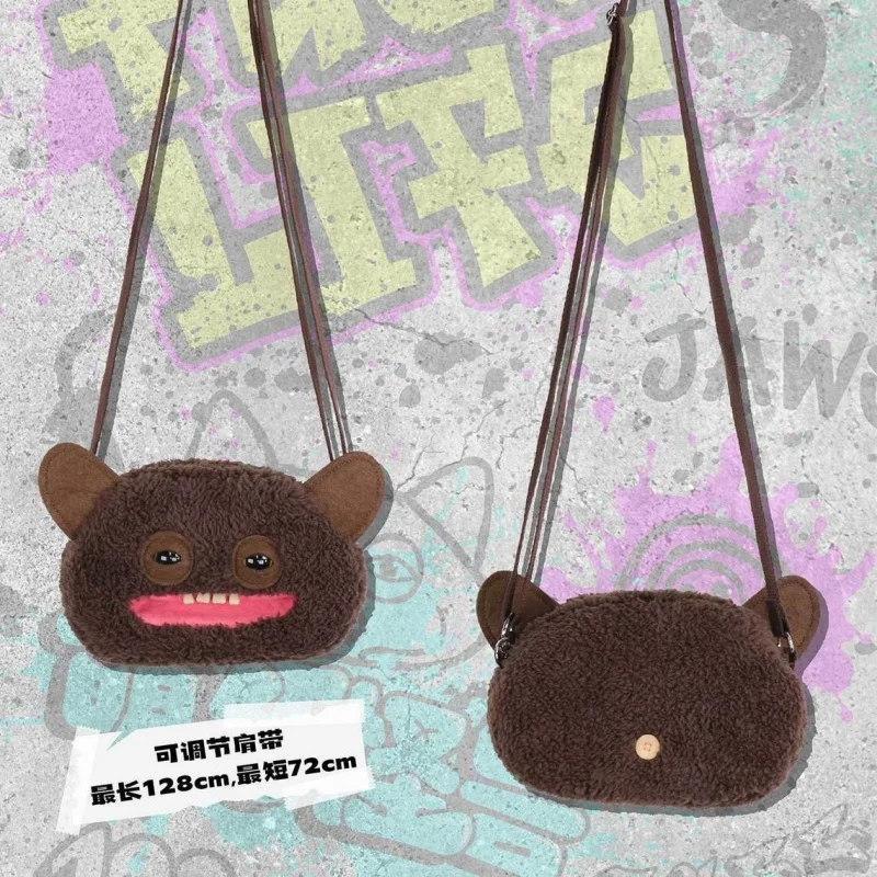 

Official Fuggler Cute Ugly Monster Sloping Bag Backpack Adorable Unisex Fluffy Stuffed Animal Bag Gift Laughter Monster Brown