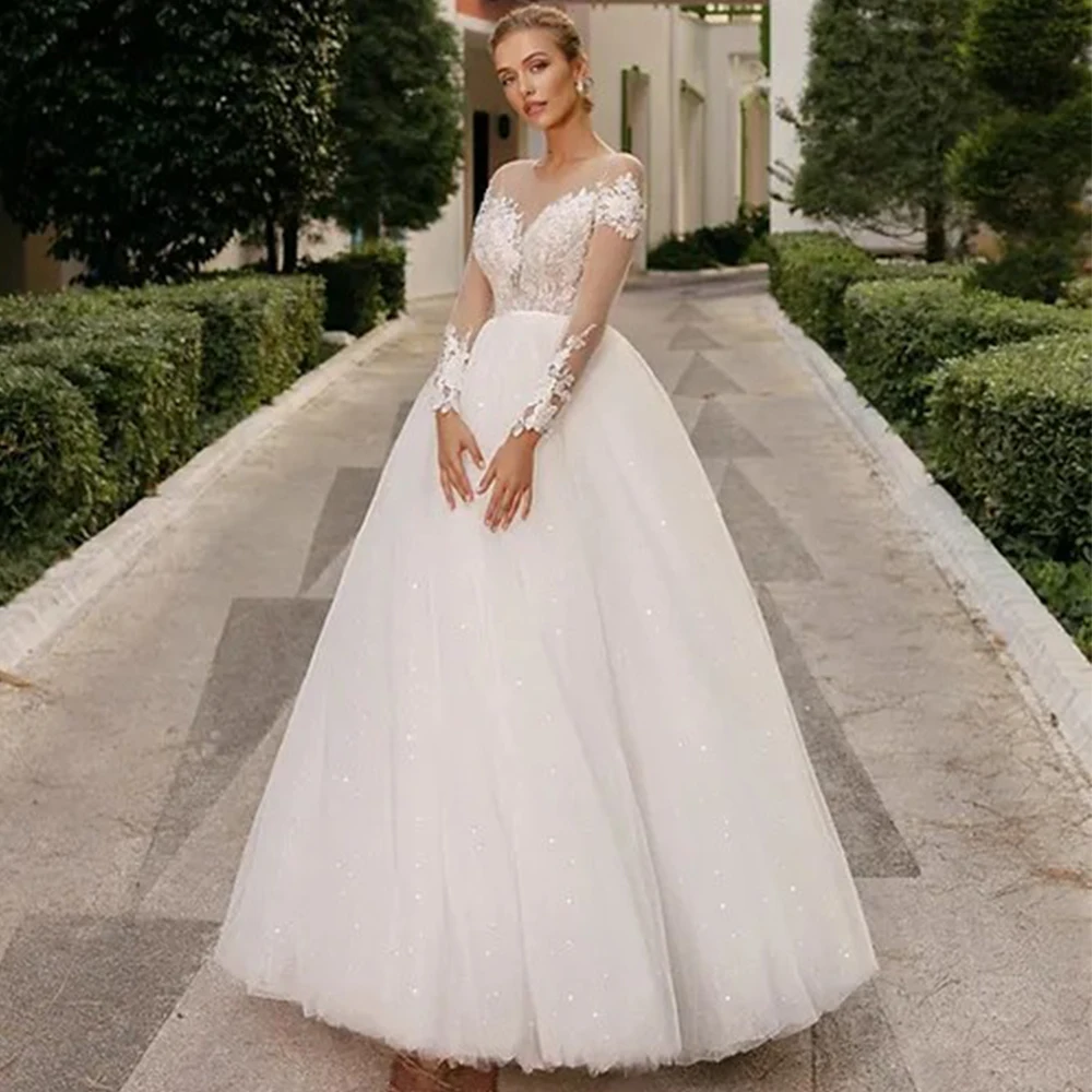 

Modern Tulle Shiny Wedding Dress O-Neck Illusion Long Sleeves with Applique A-Line Bride Buttons Custom Made Floor Length Gowns