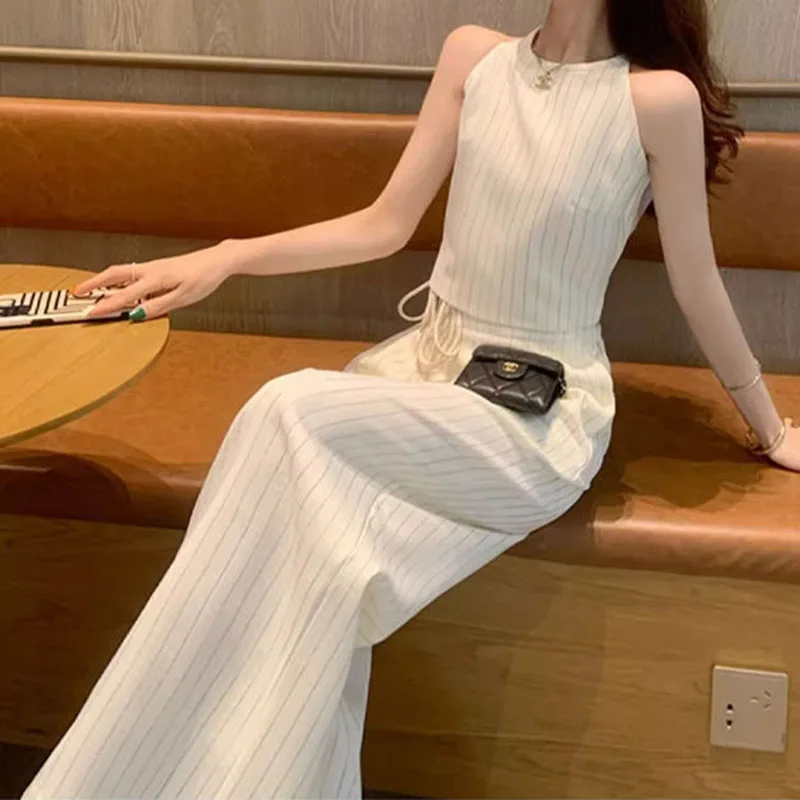 Small fragrance suit female 2024 summer new high sense niche temperament striped vest wide-leg pants two-piece.