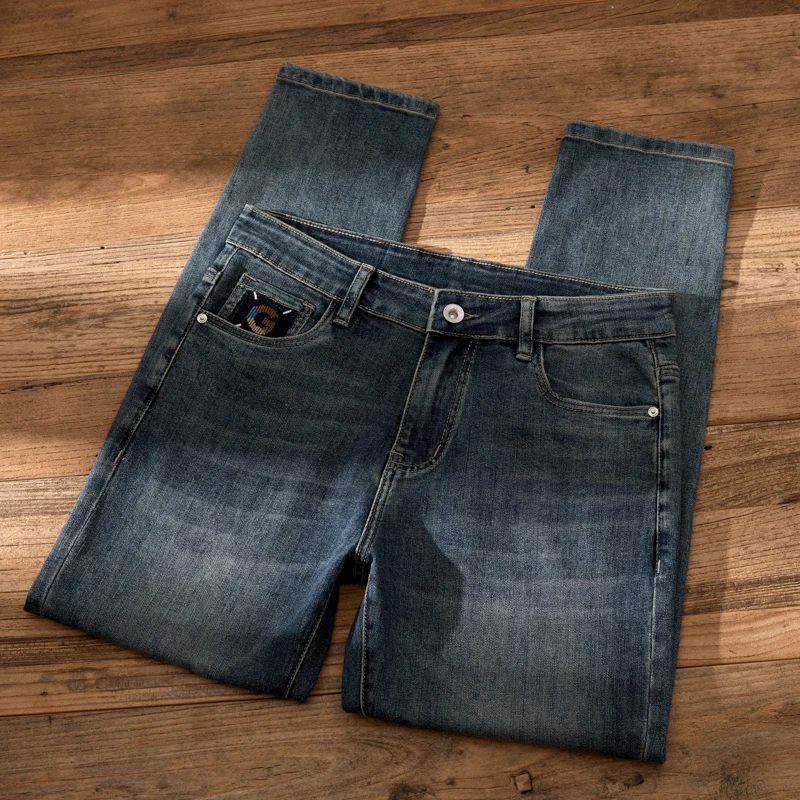 Jeans retrò da uomo 2023 autunno nuovi pantaloni a matita ricamati con lavaggio ad acqua di fascia alta pantaloni lunghi nostalgici alla moda