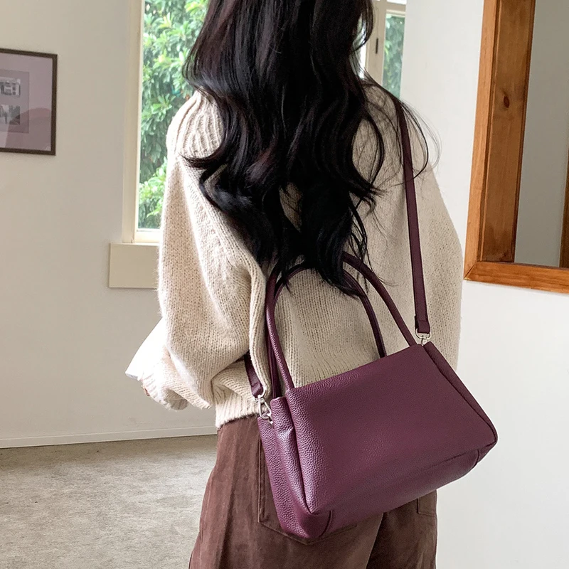 حقائب نسائية كورية كاجوال فاخرة بتصميم جديد لعام 2026، مصنوعة من مادة البولي يوريثان، بنمط الليتشي، مع جيب داخلي وحقيبة كتف بمقبض علوي جودة عالية ًالشحن مجانا وصول الشحن السريع