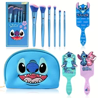 Lindo juego de pinceles de maquillaje Stitch de dibujos animados azules, bolsa de maquillaje bordada, peine con cojín de aire, ¡la opción perfecta para regalos navideños!