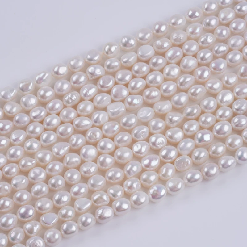 

Through Hole 10-11mm AAA white color natural freshwater baroque pearl strand