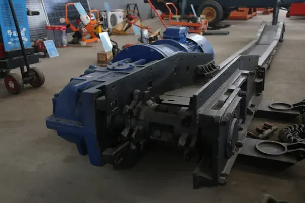 Raspador mecânico Transportador, Raspador