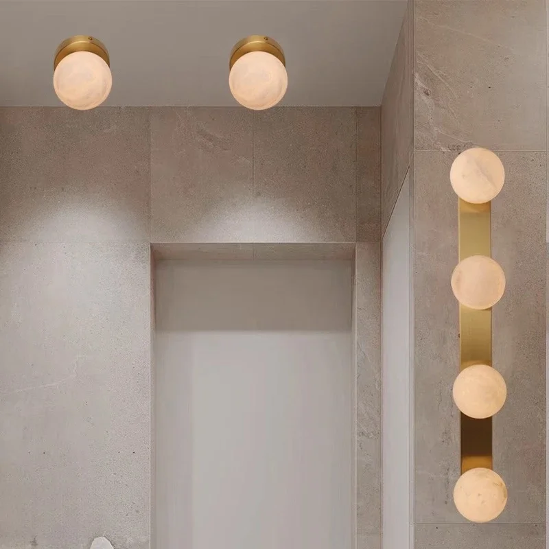 Nordic minimalist all-copper Spanish natural marble wall lamp living room background corridor minimalist light luxury lamps