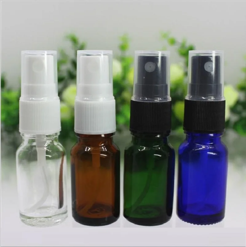 Flacone in vetro verde/trasparente/blu/marrone da 50 pezzi da 10ml con pompa spray per nebulizzazione nera bianca per l'imballaggio della pelle dell'acqua del siero dell'olio essenziale