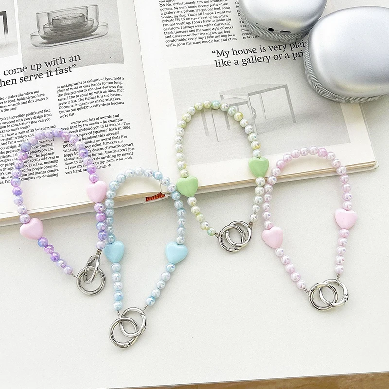 

Love Heart Pearl Bead Phone Strap for iPhone, Samsung, others; Includes Bag Decoration and Key Ring Feature