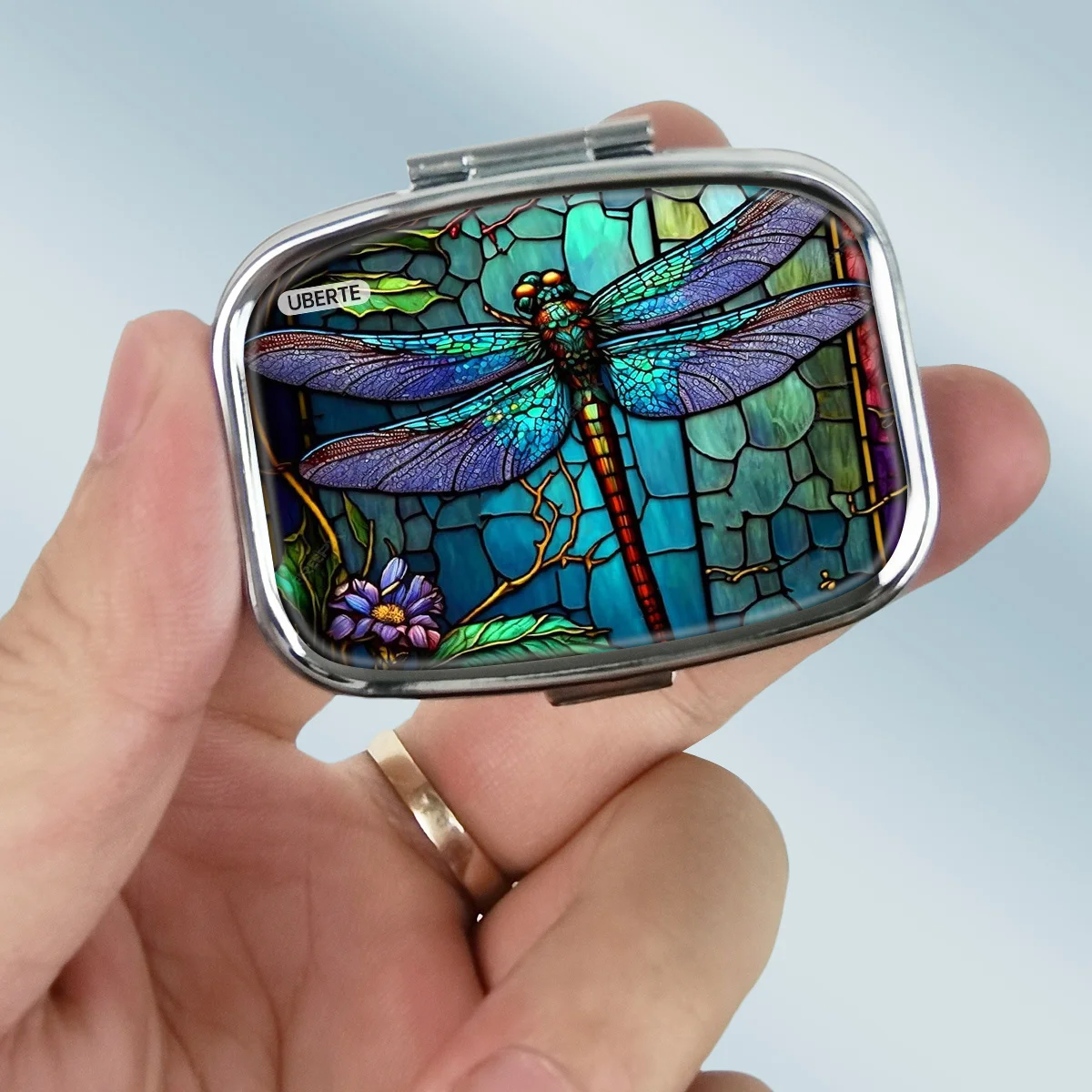 This Colorful and Elegantly Designed Dragonfly-Shaped Pill Box Features a Portable Mini Square Design and Two Compartments, Making It Perfect for Storing Medicines and Other Small Items. It Is an Ideal Gift for Family and Friends.