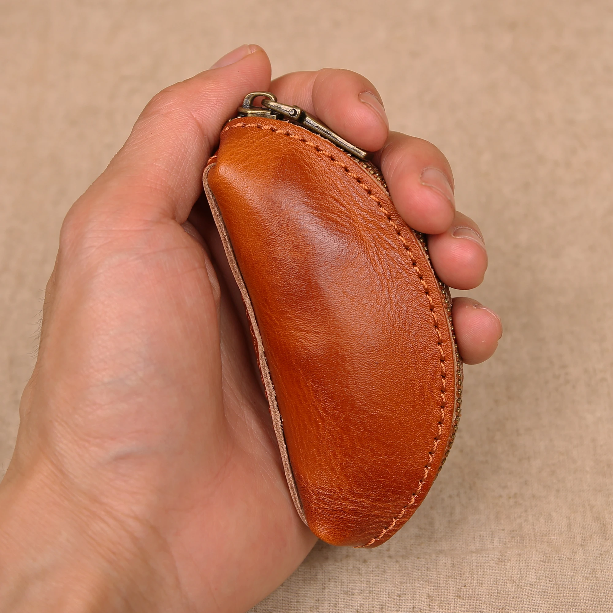 حافظة مفاتيح من الجلد الطبيعي الراقية، محفظة عملات معدنية من جلد البقر المحبب، حقيبة تخزين متينة ومقاومة للاهتراء، حافظة سماعة أذن