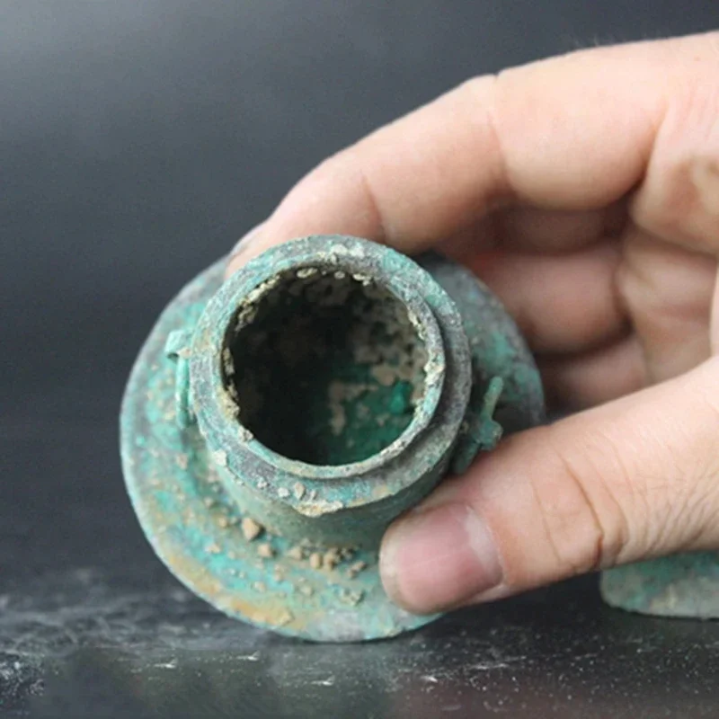 Collection of old Chinese bronzes, retro Han Dynasty utensils, small jars, three-legged small ornaments