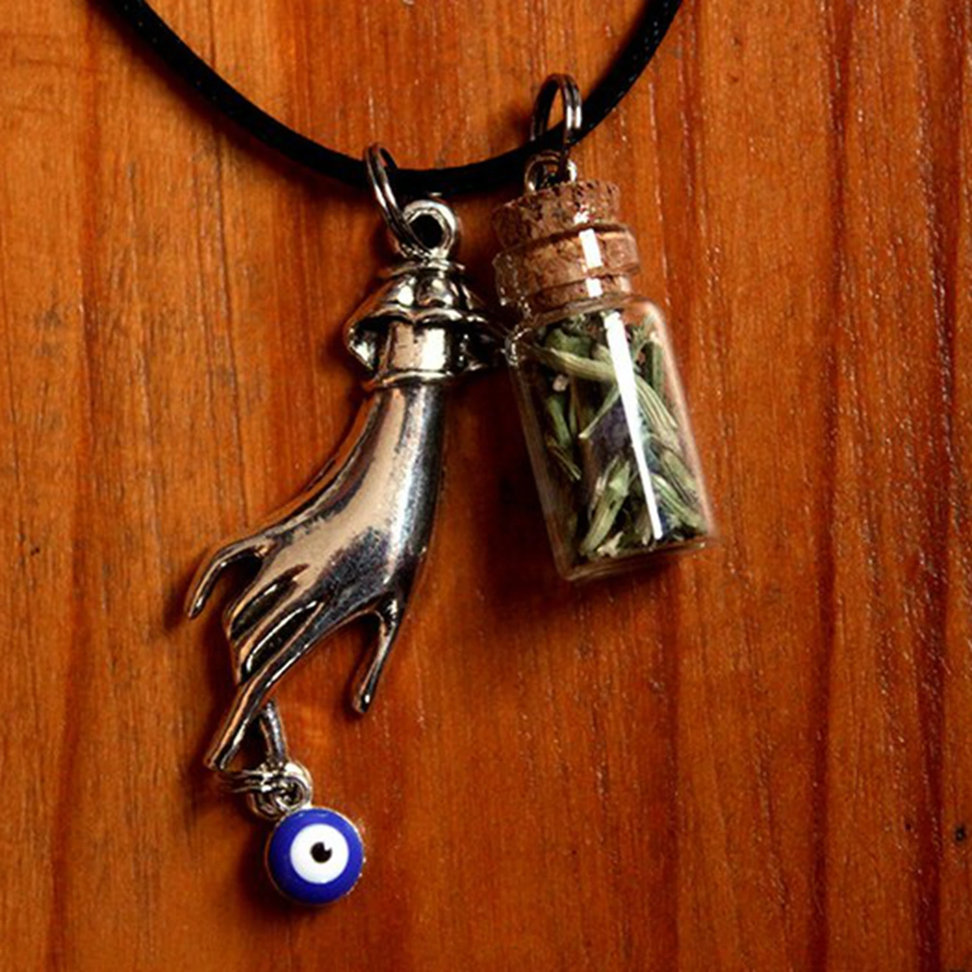 Necklace against the evil eye double pendant hand and glass vial filled with hyssop psychic protection plant spell green magic