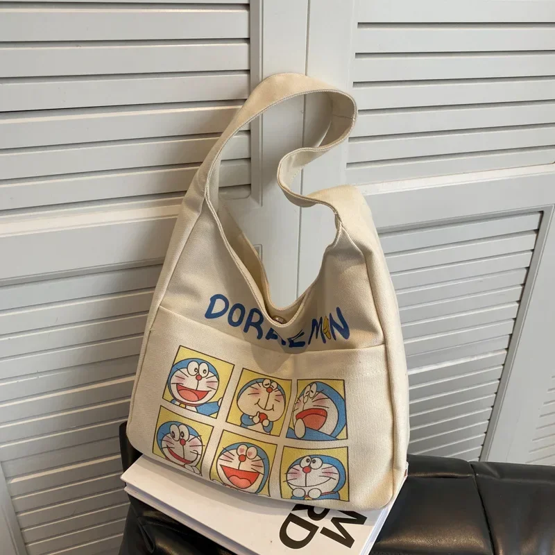 Sac fourre-tout en toile Doraemon pour femmes, sac de rangement de grande capacité, sac à main de classe étudiant, nouvelle mode, dessin animé